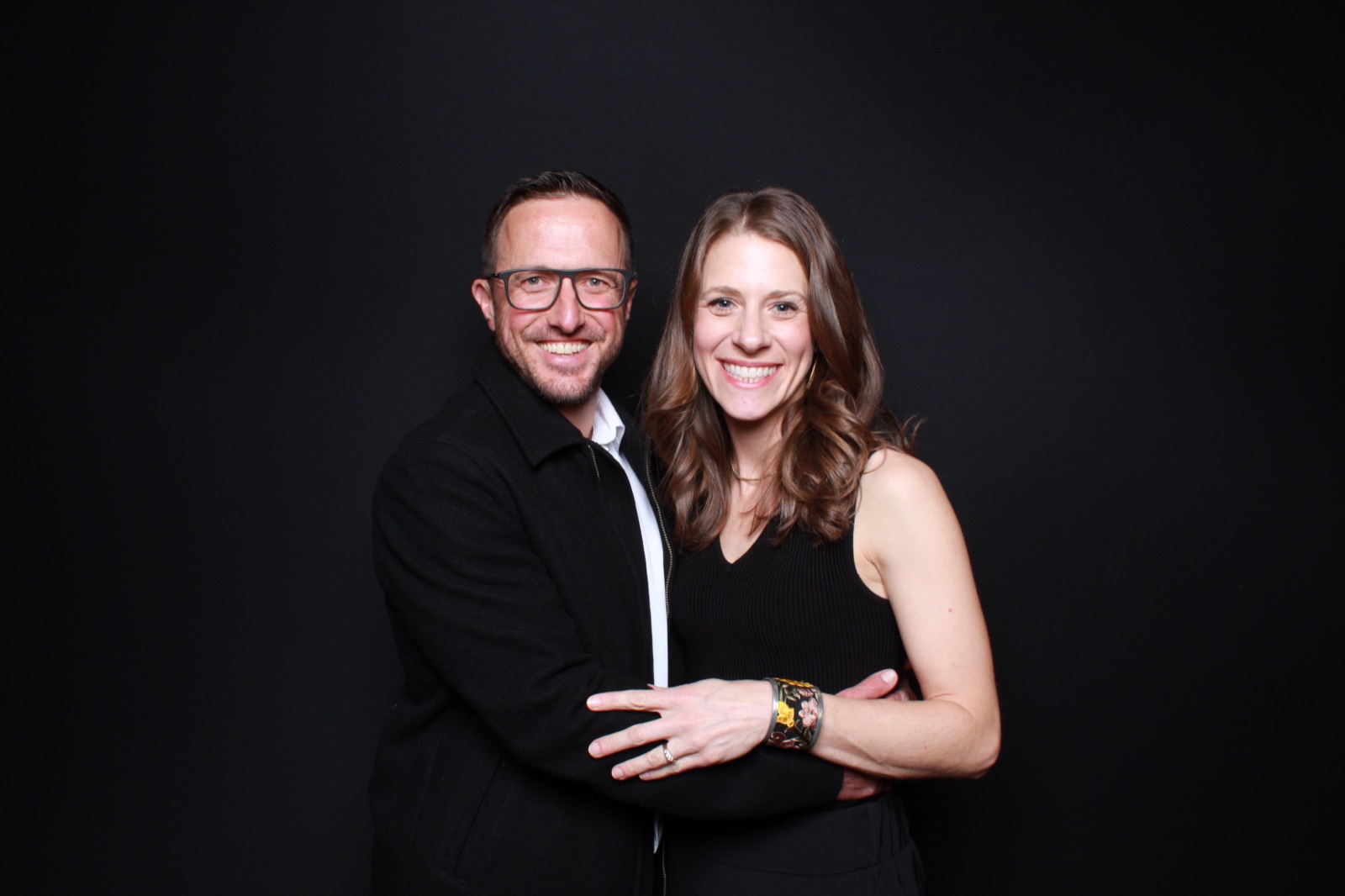 Couple at a nonprofit gala photo booth